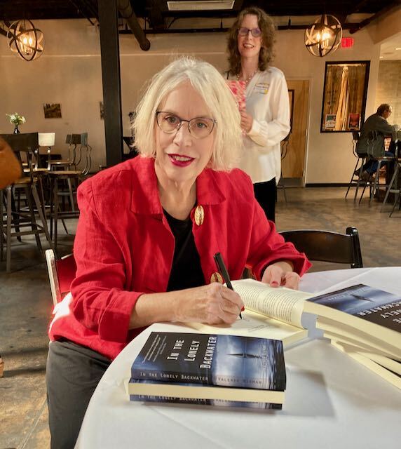 Valerie Nieman signing books